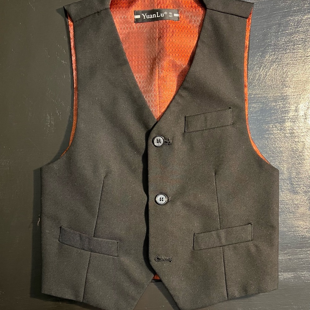 Black suit for 6 year boy one time used special for weeding or any party